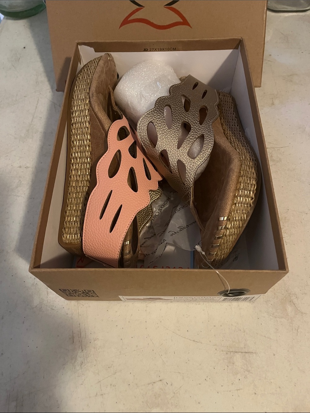 Modzori Blush flips to Tan Metallic sandals. New in original packaging.